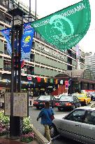 Yokohama decorated with banners and flags